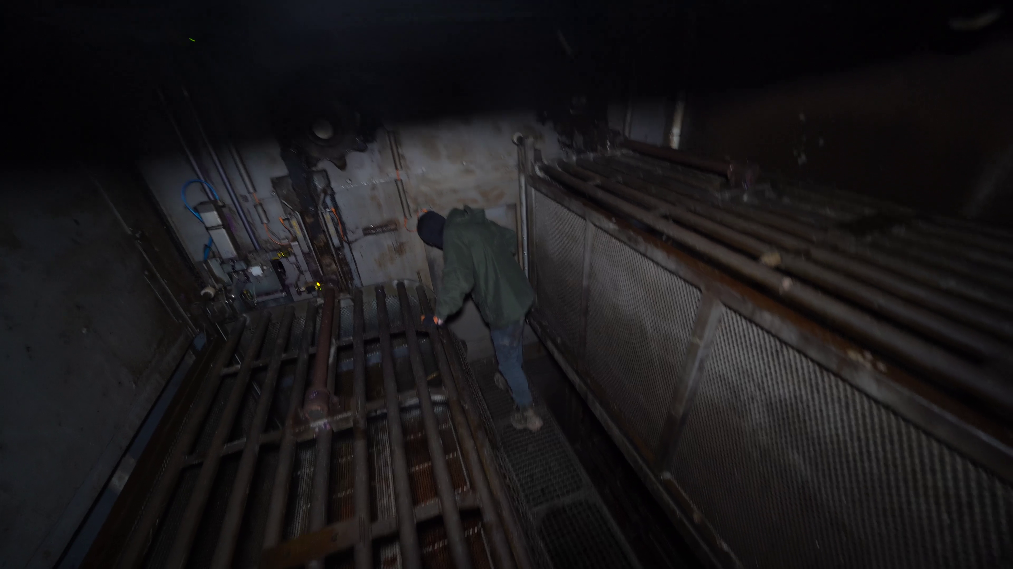 An investigator stands inside the gas chamber at Diamond Valley Pork