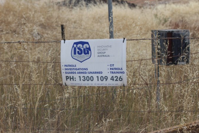Security warning on perimeter fence