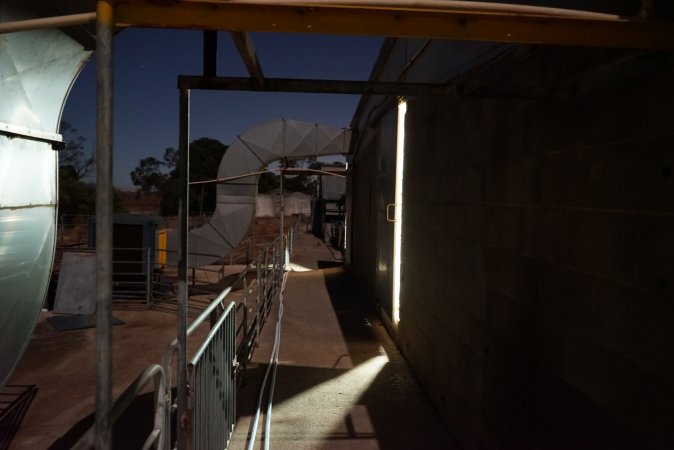 Piggery sheds outside at night