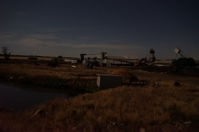 Piggery sheds outside at night