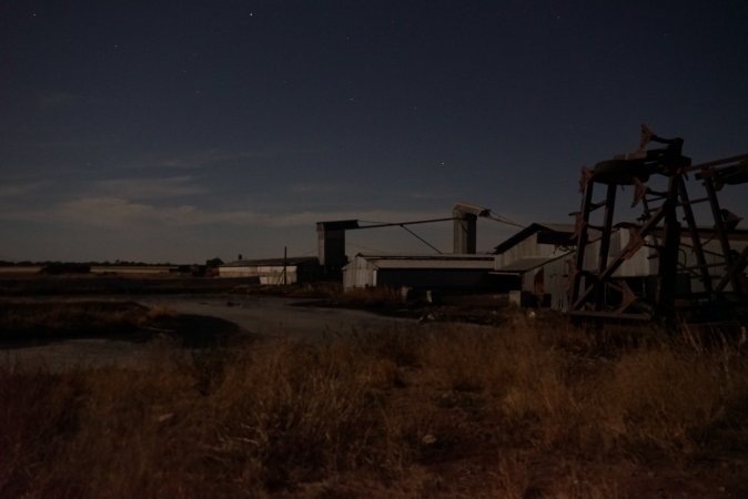 Piggery sheds outside at night