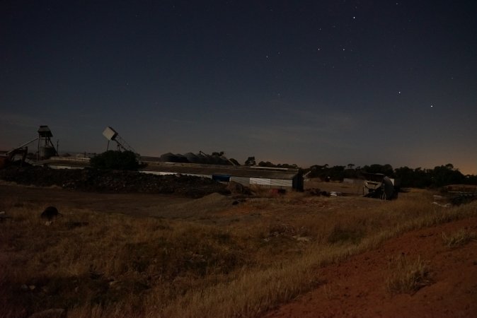 Piggery sheds outside at night