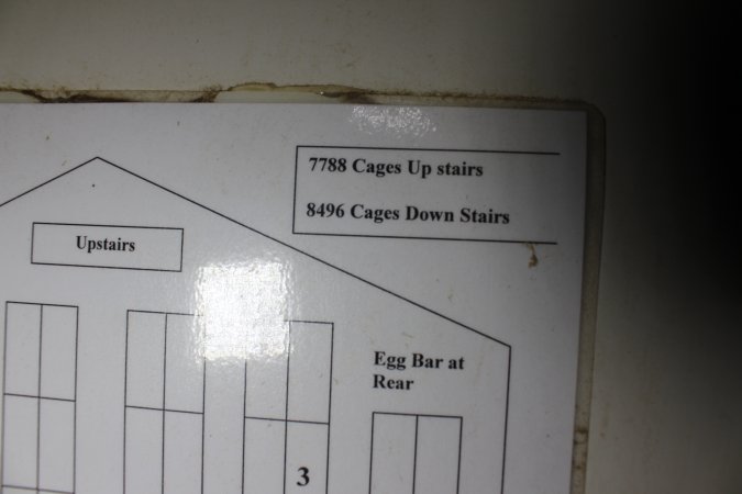 Signage with diagram and numbers of cages