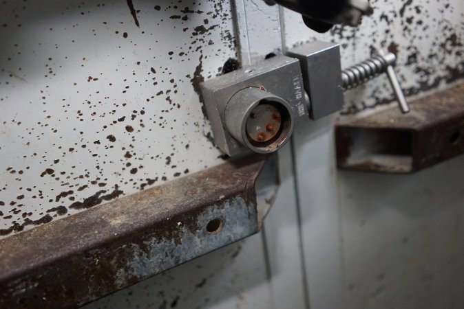 Lock on door of sealed maceration room