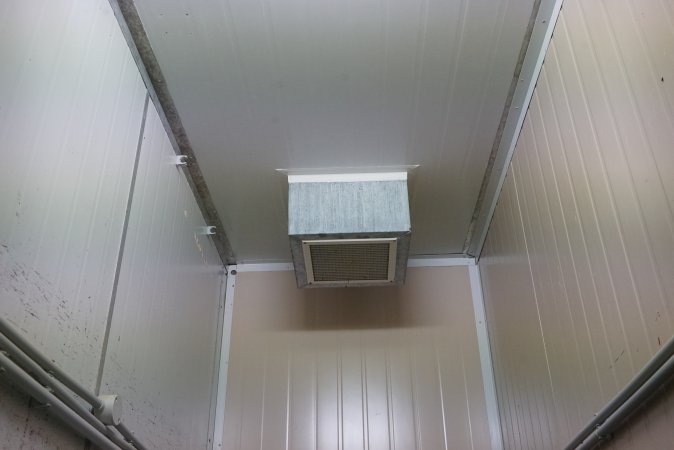 Vent above macerator in sealed room