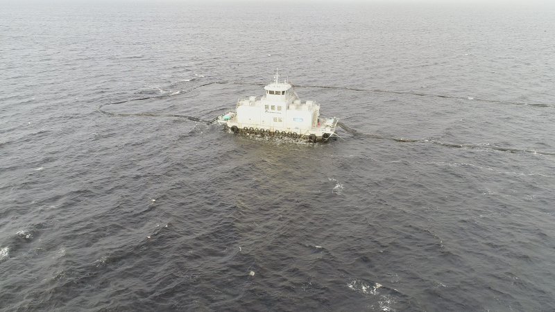 Drone flyover of offshore salmon farm