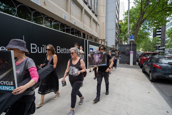 Activists protest the widespread use of cages for pigs