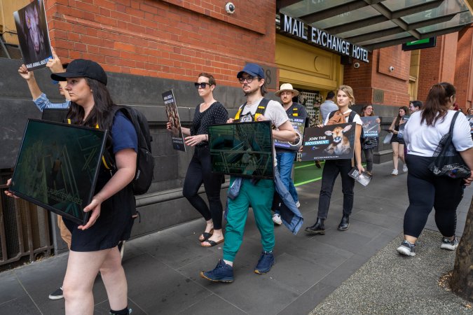 Activists protest the widespread use of cages for pigs