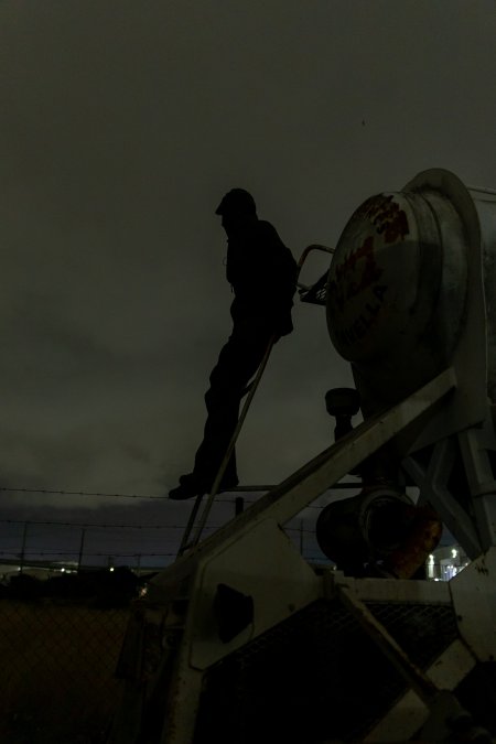 Investigator keeps watch for vehicles entering slaughterhouse