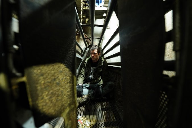 Activist prepares to seal inside a gondola in the gas chamber