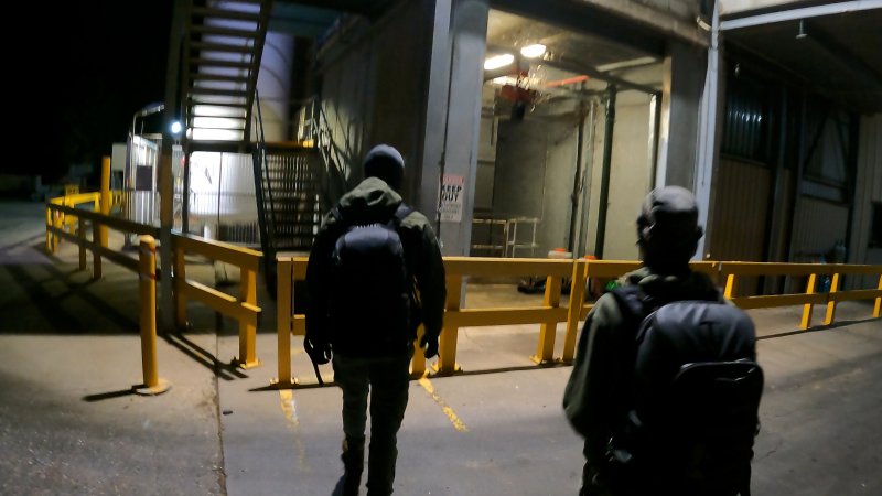 Investigators approaching Corowa Slaughterhouse