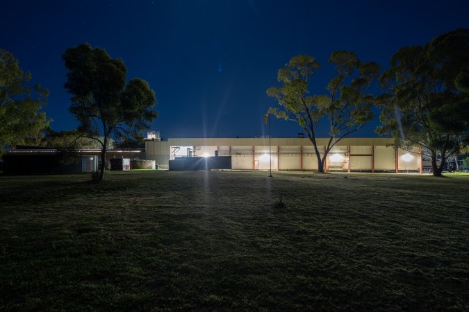 Outside slaughterhouse at night