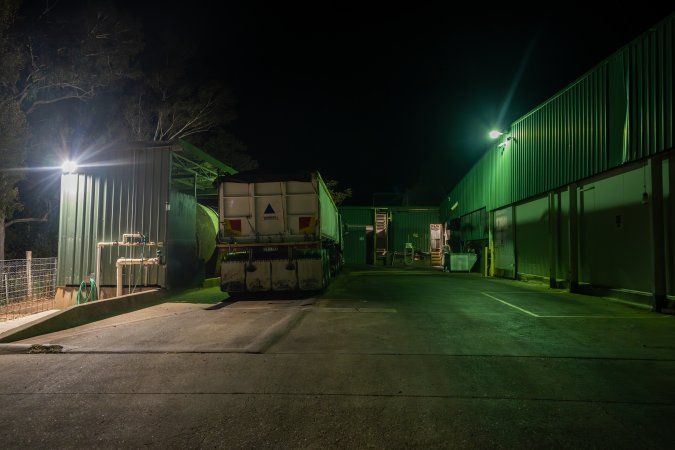 Outside back of slaughterhouse at night