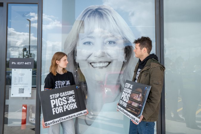 Protesters rallying outside Ros Spence MP's electorate office in Craigieburn
