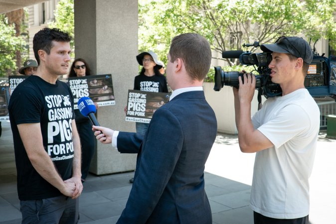 Animal rights activists attending the Rally For Pigs 2025