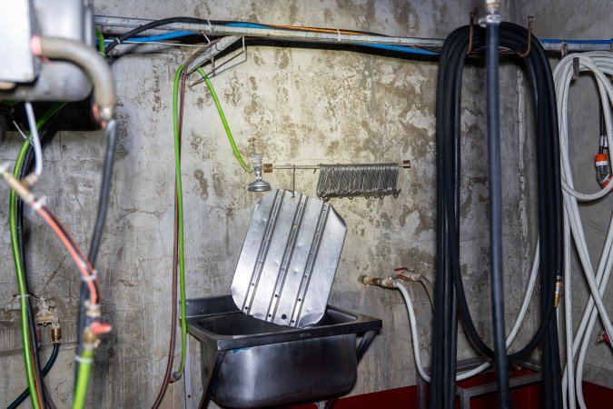 Inside of the kill room at Millmerran Meats. Shackles used to hoist pigs and sheep to the shackle line, kept over a washing sink