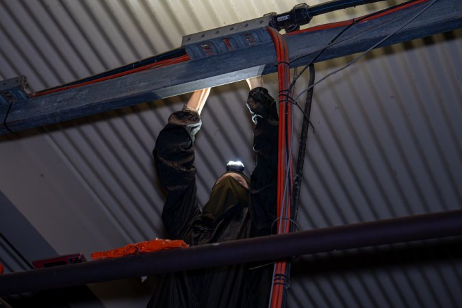 Investigator looks for places to install cameras