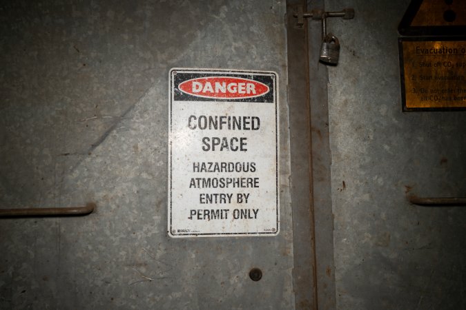 Sign on gas chamber