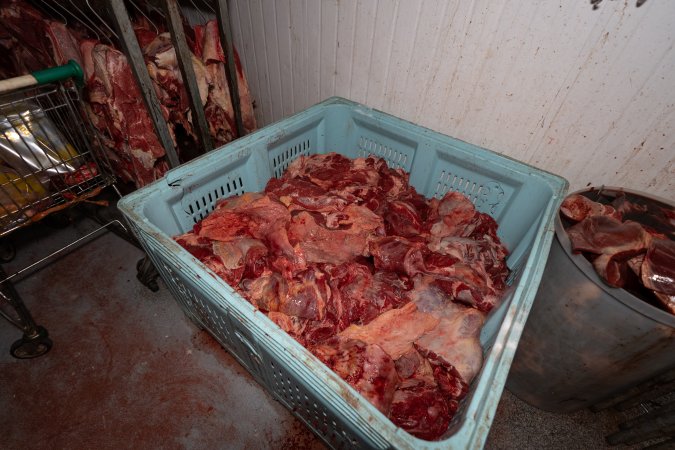 Crates of meat in chiller