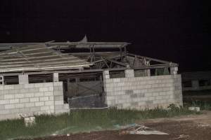 Damaged roof of grower shed - After closure of farm - Captured at Wally's Piggery, Jeir NSW Australia.