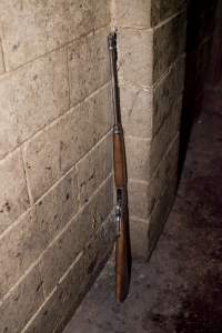 Rifle propped against wall of slaughter room - Australian pig farming - Captured at Wally's Piggery, Jeir NSW Australia.