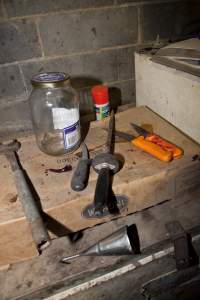 Bloody knives in slaughter room - Australian pig farming - Captured at Wally's Piggery, Jeir NSW Australia.