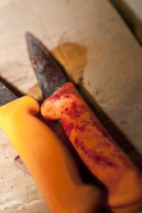 Bloody knives in slaughter room - Australian pig farming - Captured at Wally's Piggery, Jeir NSW Australia.