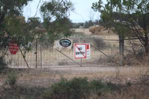 Signage on front gate - Australian pig farming - Captured at Dublin Piggery, Dublin SA Australia.