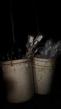 Buckets of pork stork catheters - Australian pig farming - Captured at Yelmah Piggery, Magdala SA Australia.