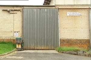 Large sliding door and sign showing 'LE Giles & Sons Abattoir' - Captured at LE Giles & Sons Abattoir, Trafalgar VIC Australia.