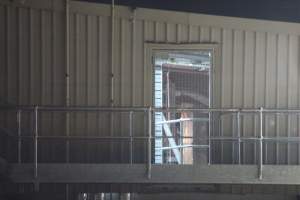 Door to maintenance ceiling - Corowa slaughterhouse outside at night - Captured at Corowa Slaughterhouse, Redlands NSW Australia.