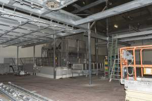 New killing/processing building containing giant gas chamber - Under construction at time of photos (2015). Gondolas much larger to gas many more pigs at once. Side of chamber opens, wall closes in to push pigs into gondola. - Captured at Diamond Valley Pork, Laverton North VIC Australia.