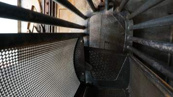 Gondola inside gas chamber for pigs - Butina carbon dioxide gas chamber for 'controlled atmosphere killing' of pigs - Captured at Benalla Abattoir, Benalla VIC Australia.