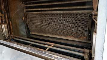 Gondola inside gas chamber for pigs - Butina carbon dioxide gas chamber for 'controlled atmosphere killing' of pigs - Captured at Benalla Abattoir, Benalla VIC Australia.