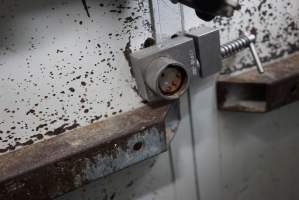 Lock on door of sealed maceration room - Key removed. Key can either be in door, or in control panel to turn on macerator, so that theoretically the door cannot be open while the macerator is on. - Captured at SBA Hatchery, Bagshot VIC Australia.