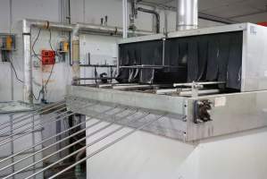 Tray cleaning machine - Cleans empty trays after chicks dumped out - Captured at SBA Hatchery, Bagshot VIC Australia.