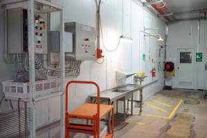 Control panels in internal corridor - For activating macerator and other machinery. Debeaking room and offices at end of corridor. - Captured at SBA Hatchery, Bagshot VIC Australia.