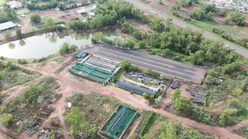 Cages at hidden Crocodylus crocodile farm - Drone flyover - Captured at Crocodylus Park Farm & Abattoir, Knuckey Lagoon NT Australia.
