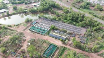 Cages at hidden Crocodylus crocodile farm - Drone flyover - Captured at Crocodylus Park, Knuckey Lagoon NT Australia.