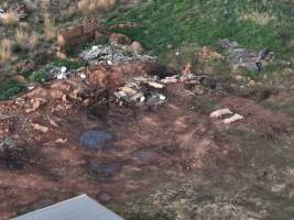 Pile of dead pigs outside piggery - Aerial view from drone - Captured at Gowanbrae Piggery, Pine Lodge VIC Australia.