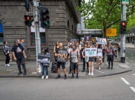 Activists protest the widespread use of cages for pigs - Image taken at Spencer Street as part of the Melbourne Vegan Takeover - Day of Action for Animals - Captured at VIC.