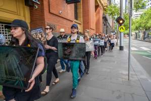 Activists protest the widespread use of cages for pigs - Image taken at Spencer Street as part of the Melbourne Vegan Takeover - Day of Action for Animals - Captured at VIC.