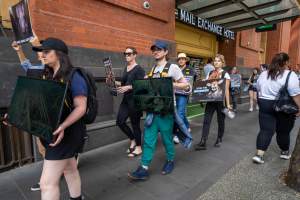 Activists protest the widespread use of cages for pigs - Image taken at Spencer Street as part of the Melbourne Vegan Takeover - Day of Action for Animals - Captured at VIC.