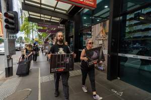 Activists protest the widespread use of cages for pigs - Image taken at Spencer Street as part of the Melbourne Vegan Takeover - Day of Action for Animals - Captured at VIC.