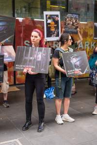 Activists protest the widespread use of cages for pigs - Image taken at Spencer Street as part of the Melbourne Vegan Takeover - Day of Action for Animals - Captured at VIC.