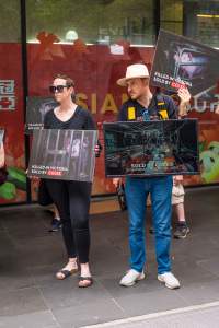 Activists protest the widespread use of cages for pigs - Image taken at Spencer Street as part of the Melbourne Vegan Takeover - Day of Action for Animals - Captured at VIC.