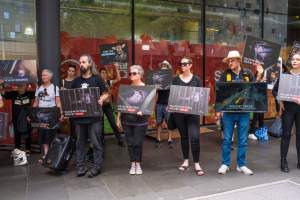 Activists protest the widespread use of cages for pigs - Image taken at Spencer Street as part of the Melbourne Vegan Takeover - Day of Action for Animals - Captured at VIC.