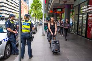 Activists protest the widespread use of cages for pigs - Image taken at Spencer Street as part of the Melbourne Vegan Takeover - Day of Action for Animals - Captured at VIC.