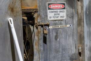 Door to gas chamber - Door with padlock leading into Butina combi carbon dioxide gas chamber - Captured at Benalla Abattoir, Benalla VIC Australia.