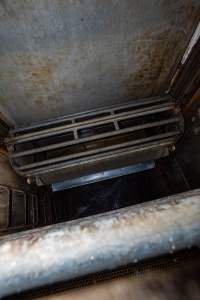 Gondolas in the gas chamber - Looking down into the gondolas in the Butina combi carbon dioxide gas chamber - Captured at Benalla Abattoir, Benalla VIC Australia.